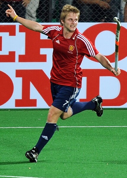 English hockey player Ashley Jackson celebrates scoring a goal against India during their World Cup 2010 match at the Major Dhyan Chand Stadium in New Delhi. (AFP Photo) Unbeaten England enter semis