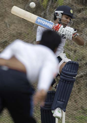 Rohit Sharma avoids being hit by a delivery of teammate RP Singh during a training session at Beausejour ground in Gros-Islet. (AP Photo) India prepare for 3rd ODI