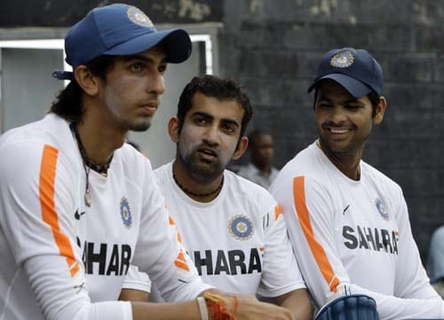 Gautam Gambhir speaks as teammates RP Singh and Ishant Sharma listen during a break in their training session at Beausejour ground in Gros-Islet. (AP Photo) India prepare for 3rd ODI