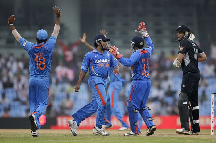 Indian cricketers celebrate the dismissal of Tim Southee the last wicket of New Zealand innings during their last ODI in Chennai. (AP Photo) India sweep series 5-0