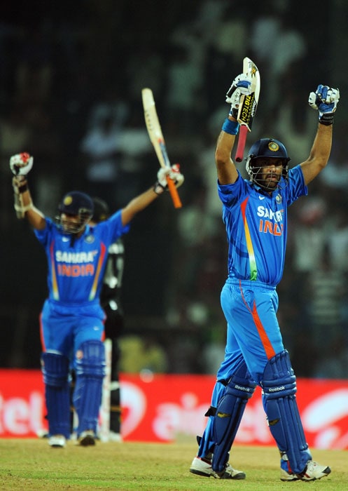 Yuvraj Singh and Parthiv Patel celebrate the win over New Zealand during the final ODI in Chennai. (AFP Photo) India sweep series 5-0