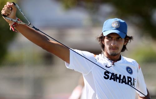 Ishant Sharma goes through his stretching exercises as he recovers from a shoulder injury, during training in Napier. (AFP Photo) Team India net session at Napier
