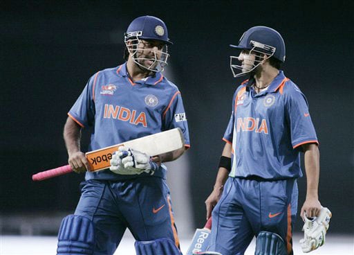 India's Mahendra Singh Dhoni with Gautum Gambhir walk off the pitch after they defeated Pakistan by 9 wickets in their warm up match for the Twenty20 World Championship match at the Oval in London on June 3, 2009. (AP Photo) Ind vs Pak warm-up match