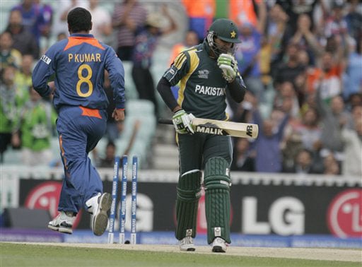 Shahzaib Hasan reacts after being bowled by Praveen Kumar in their warm up match for the Twenty20 World Championship at the Oval in London. (AP Photo) Ind vs Pak warm-up match