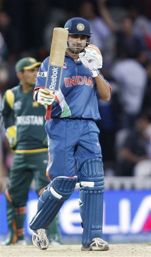Gautam Gambhir reacts to his half-century after playing a shot off the bowling of Umar Gul during their Twenty20 World Championship warm-up match at the Oval in London. (AP Photo) Ind vs Pak warm-up match