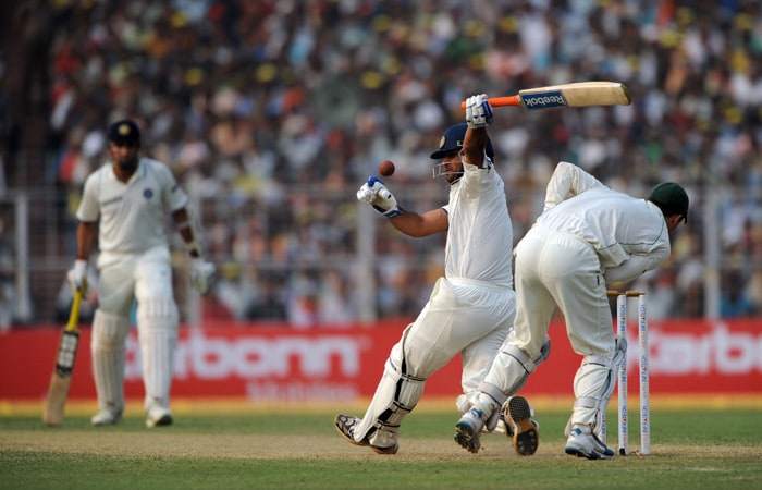 Mahendra Singh Dhoni (2 R) plays a shot during the third day of the second Test match between India and South Africa at The Eden Gardens Cricket Stadium in Kolkata on February 16, 2010. India have scored 643 runs for the loss of six wickets after the South African score of 296 runs in their first innings. (AFP Photo) India vs SA: 2nd Test, Day 3