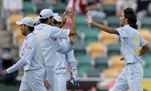 I Sharma, right, celebrates with teammates after taking the wicket of SL Malinga during their tri-series One-Day International match in Hobart on Tuesday, February 26, 2008. Sri Lanka was all out for 179 runs. 11th match - India vs Sri Lanka