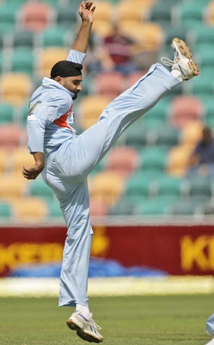 Harbhajan Singh celebrates by kicking the ball after taking the wicket of CK Kapugedera during their tri-series One-Day International match in Hobart on Tuesday, February 26, 2008. Sri Lanka was all out for 179 runs. 11th match - India vs Sri Lanka