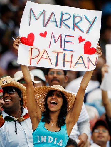 An Indian cricket fan holds up a banner for one of the Indian batsman during their One-Day cricket international against Sri Lanka in Canberra on Tuesday, February 12, 2008. 5th Match: India vs Sri Lanka