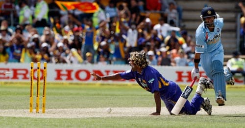 Lasith Malinga, left, appeals successfully for a run out of Indian batsman Gautam Gambhir, right, during their One-Day cricket international in Canberra on Tuesday, February 12, 2008. 5th Match: India vs Sri Lanka