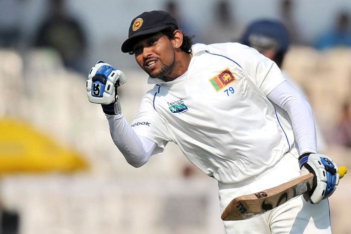 Tillakaratne Dilshan celebrates after scoring a century on the first day of the third Test between India and Sri Lanka in Mumbai. (AFP Photo) India vs SL: 3rd Test, Day 1