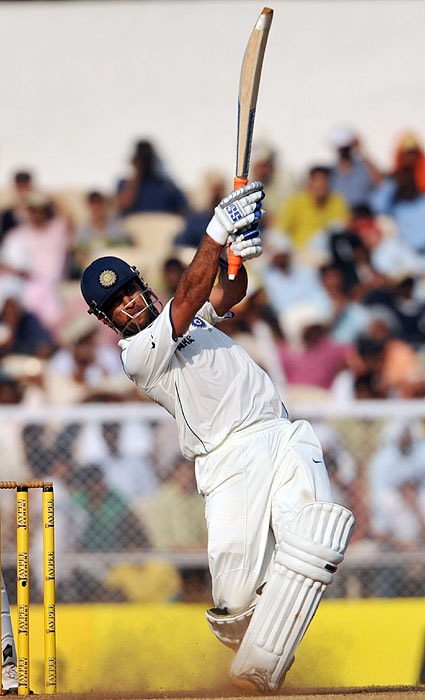 India captain Mahendra Singh Dhoni bats during his unbeaten century on the third day of the third Test match against Sri Lanka in Mumbai on Friday, December 04, 2009. Sri Lanka trails by 322 runs with 10 wickets remaining, in the second innings. India declared their first innings at 726 runs. India leads the 3-match series 1-0. (AFP Photo) India vs SL: 3rd Test, Day 3