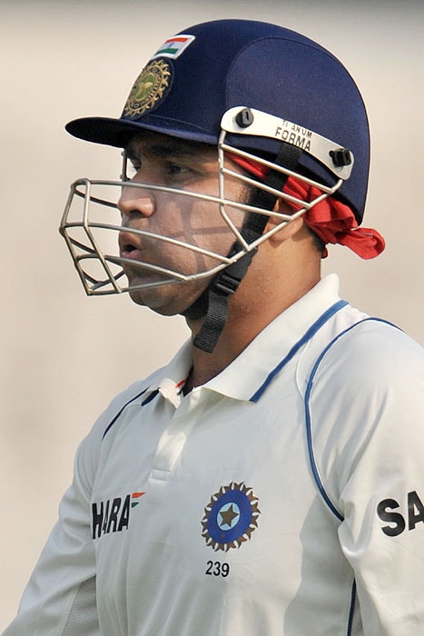 India's Virender Sehwag gestures after his dismissal during play on the third day of the third Test against Sri Lanka in Mumbai on Friday. (AFP Photo) India vs SL: 3rd Test, Day 3