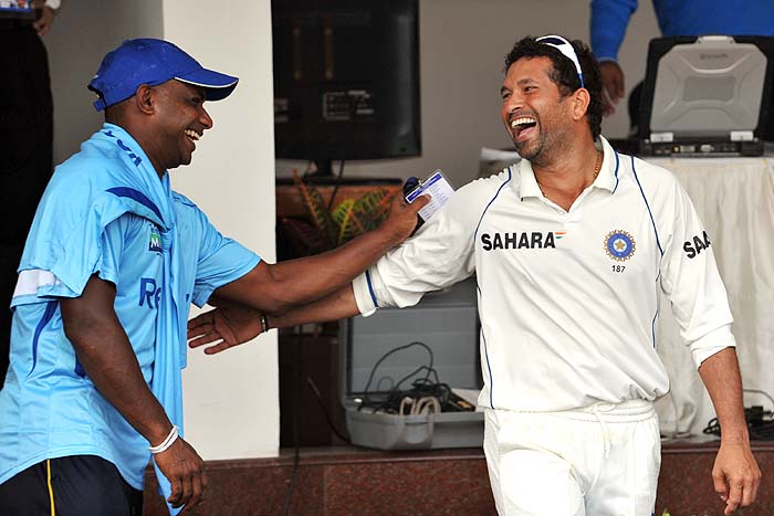 Sri Lanka's Sanath Jayasurya and India's Sachin Tendulkar share a light moment after the final day of the third Test in Mumbai on Sunday. (AFP Photo) Men in Blue on top of the world
