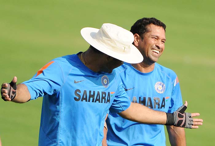 India's Virender Sehwag jokes with teammate Sachin Tendulkar during a training session on the eve of the first Test against Sri Lanka in Ahmedabad on Sunday. (AFP Photo) India, Lanka gear up for Tests