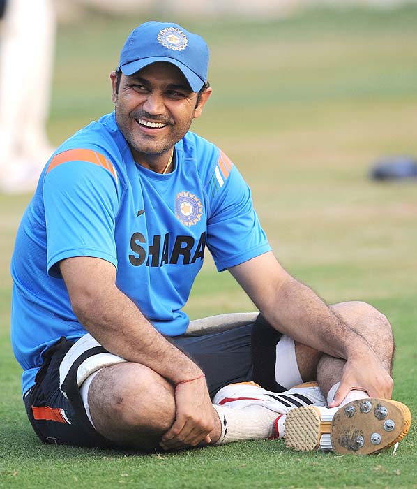 India's Virender Sehwag smiles during a training session at the nets in Ahmedabad on Sunday. (AFP Photo) India, Lanka gear up for Tests