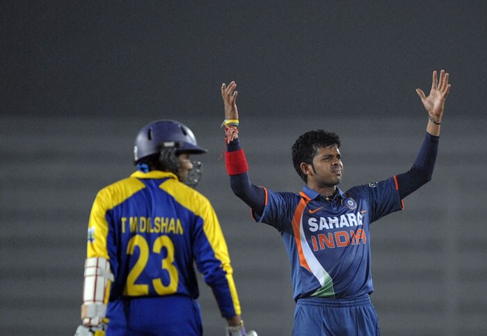 Sreesanth reacts as Tillakaratne Dilshan looks on during the tri-series final between India and Sri Lanka at the Sher-e Bangla National Stadium in Dhaka. (AFP Photo) Tri-series Final: India vs SL