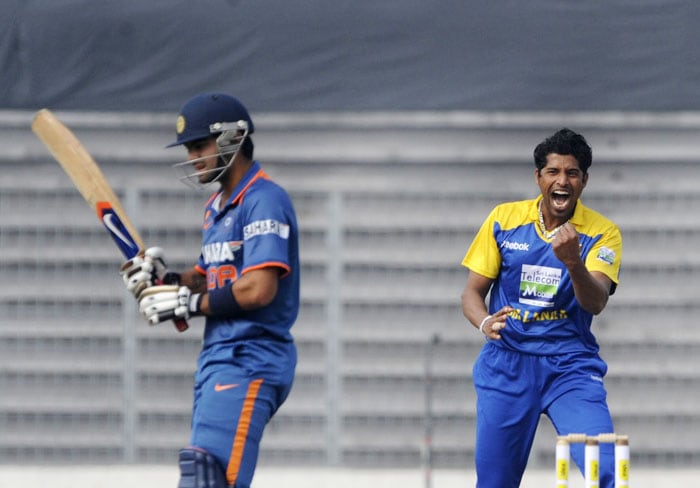Chanaka Welegedara celebrates the dismissal of Virat Kohli during the tri-series final between India and Sri Lanka at the Sher-e Bangla National Stadium in Dhaka. (AFP Photo) Tri-series Final: India vs SL