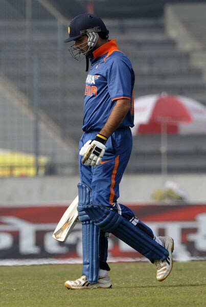 Yuvraj Singh leaves the field after losing his wicket during the tri-series final between India and Sri Lanka at the Sher-e Bangla National Stadium in Dhaka. (AFP Photo) Tri-series Final: India vs SL