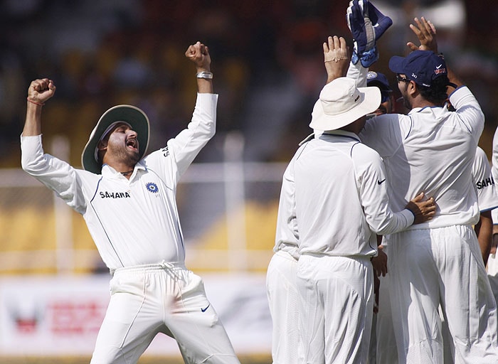 Harbhajan Singh reacts as his teammates celebrate the wicket of Thilan Samaraweera during third day of the first Test between India and Sri Lanka in Ahmedabad. (AP Photo) India vs SL: 1st Test, Day 3