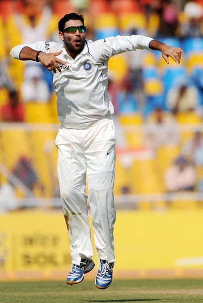 Yuvraj Singh jumps into the air on the third day of the first Test between India and Sri Lanka at the Motera stadium in Ahmedabad. (AFP Photo) India vs SL: 1st Test, Day 3