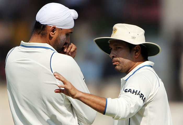 Harbhajan Singh listens to teammate Sachin Tendulkar on the third day of the first Test between India and Sri Lanka at the Motera stadium in Ahmedabad. (AFP Photo) India vs SL: 1st Test, Day 3