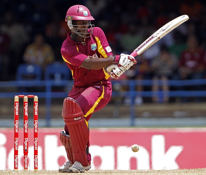 The ball bounces from the pad of Darren Sammy to be trapped LBW for 4 runs by Praveen Kumar during their first One-Day International in Port of Spain, Trinidad. (AP Photo) 1st ODI: India vs West Indies