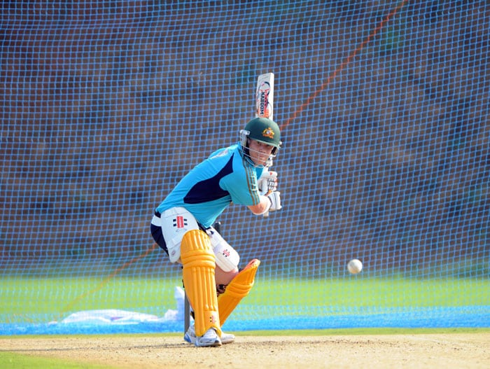 Australian cricketer David Warner plays a shot during a net practice session ahead of the second One Day International (ODI) cricket match between India and Australia. (AFP Photo) Ind vs Aus, 2nd ODI: Teams in the Nets