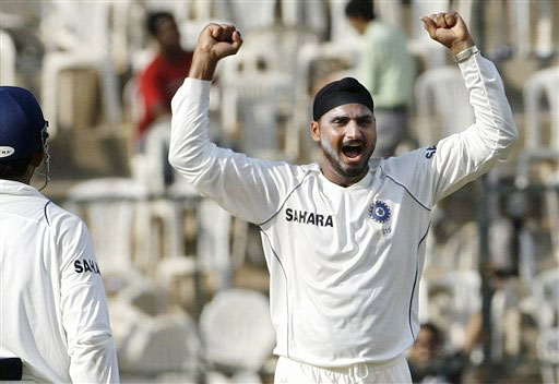 Harbhajan Singh celebrates after dismissing Ricky Ponting on the first day of their first Test match in Bangalore. India vs Australia: 1st Test, Day 1