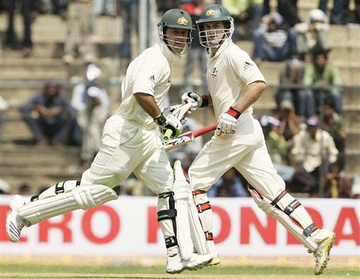 Ricky Ponting and Simon Katch score a run on the first day of the first Test between India and Australia in Bangalore. India vs Australia: 1st Test, Day 1
