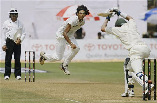 Ishant Sharma bowls to Mike Hussey on the second day of the first Test match between India and Australia in Bangalore. India vs Australia: 1st Test, Day 2