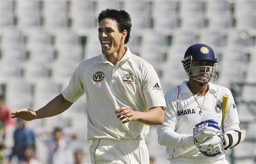 Mitchell Johnson reacts after taking the wicket of Virender Sehwag on the first day of their second Test in Mohali. India vs Australia: 2nd Test, Day 1
