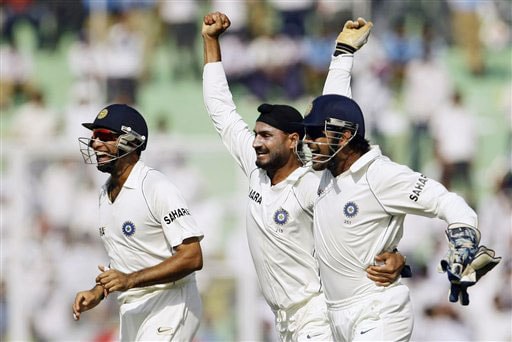 Harbhajan Singh, Mahendra Singh Dhoni and VVS Laxman react after Harbhajan took the wicket of Simon Katich on the fourth day of the second Test between India and Australia in Mohali. India vs Australia: 2nd Test, Day 4