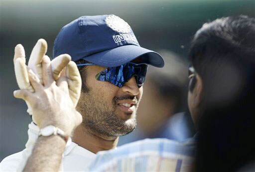 Mahendra Singh Dhoni is congratulated by Chief Selector K. Srikkanth after India defeated Australia on the final day of the second Test between India and Australia in Mohali. India vs Australia: 2nd Test, Day 5