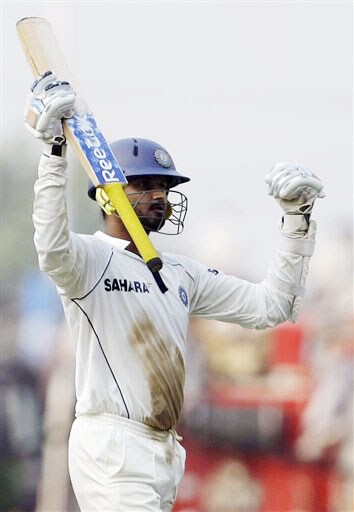 Harbhajan Singh gestures after he scored a half-century during the fourth day of the final Test between India and Australia in Nagpur. India vs Australia: 4th Test, Day 4