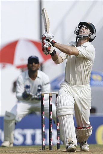 Simon Katich plays a shot that got him dismissed as Mahendra Singh Dhoni looks on during the fifth day of the final Test between India and Australia in Nagpur. India vs Australia: 4th Test, Day 5