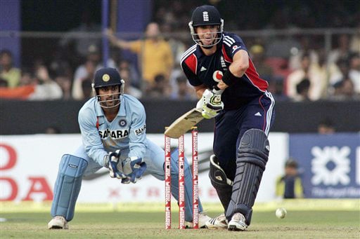 Owais Shah bats as Mahendra Singh Dhoni looks on during the fifth One-Day International match between India and England in Cuttack. (AP Photo) India vs England: 5th ODI