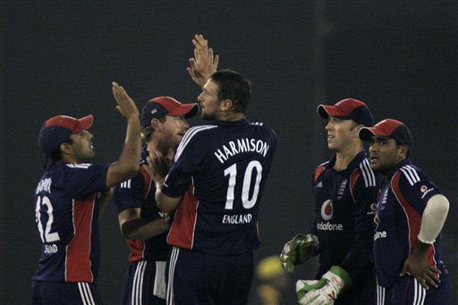 England cricketers congratulate teammate Steve Harmison for the dismissal of Sachin Tendulkar during the fifth One-Day International match between India and England in Cuttack. (AP Photo) India vs England: 5th ODI
