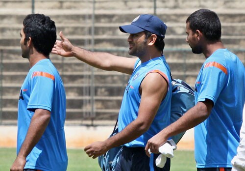 MS Dhoni, Praveen Kumar and Dinesh Karthik on the 1st day of the team's fitness and conditioning camp ahead of tri-series in Sri Lanka and Champions Trophy, in Bangalore. (PTI Photo) Team India fitness camp