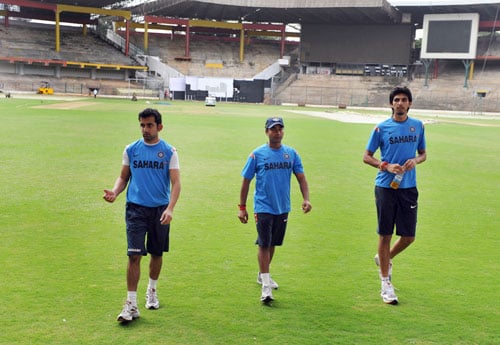 Gautam Gambhir, Amit Mishra and Ishant Sharma walk off the ground at The National Cricket Academy (NCA) at The M. Chinnaswamy Stadium in Bangalore. (AFP Photo) Team India fitness camp