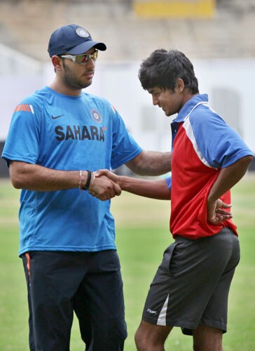 Yuvraj Singh with Manish Pandey on the first day of team's fitness and conditioning camp, ahead of tri-series in Sri Lanka and Champions Trophy, in Bangalore. (PTI Photo) Team India fitness camp