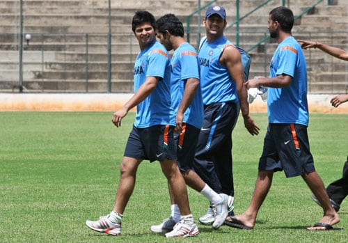 MS Dhoni, Praveen Kumar, Suresh Raina and Dinesh Karthik on the 1st day of the team's fitness and conditioning camp ahead of tri-series in Sri Lanka and Champions Trophy, in Bangalore. (PTI Photo) Team India fitness camp