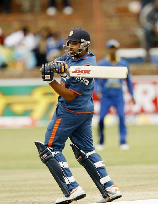 Indian batsman Rohit Sharma plays a shot during the second match of the Micromax Cup Triangular One-Day International series at Queens Sports club in Bulawayo . (AFP Photo) 2nd ODI: Ind vs Zim