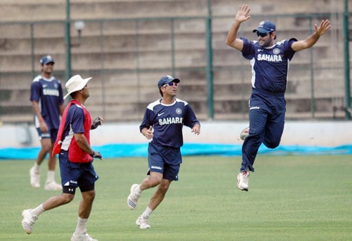 MS Dhoni and Sachin Tendulkar during a training session ahead of the Australian series at Chinnaswamy Stadium in Bangalore. (PTI Photo) Indian players at conditioning camp