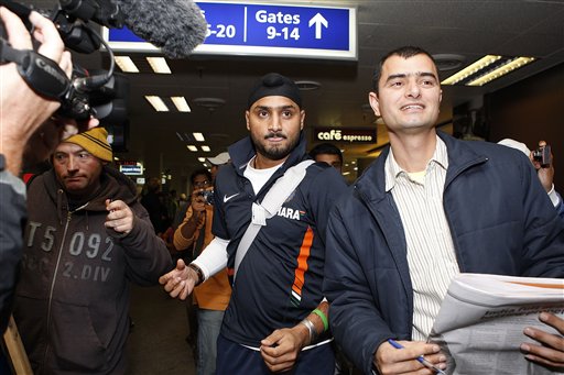 Harbhajan Singh, centre, arrives at Christchurch airport on Friday, February 20, 2009. India will play three Test matches, five one-day internationals and two twenty20 matches during the cricket tour of New Zealand. (AP Photo) India arrive in New Zealand
