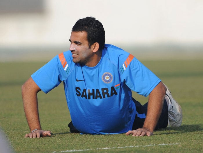 Zaheer Khan stretches with his teammates during a practice session at the Sher-e Bangla National Stadium in Dhaka. (AFP Photo) India sweat on Bangla soil