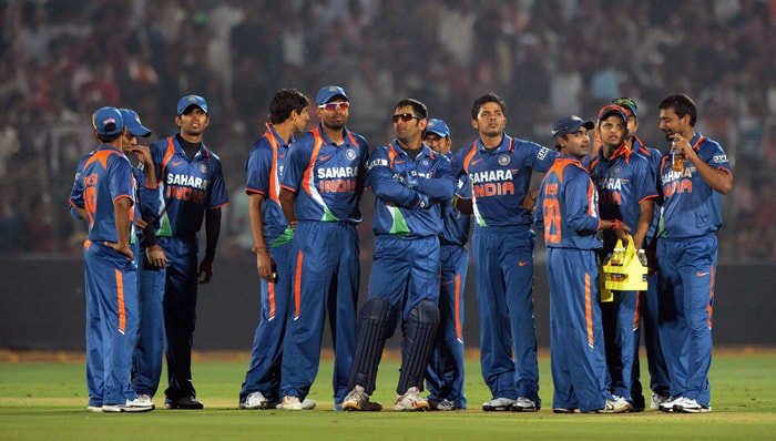 Team India wait for a pending run-out decision by the third umpire. (AFP Photo) Ind vs SA: 1st ODI