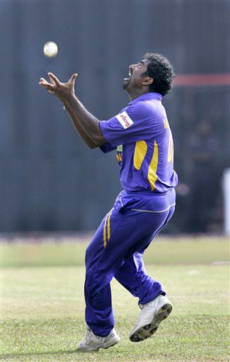 Muttiah Muralitharan takes a catch to dismiss Yuvraj Singh during the final ODI match between India and Sri Lanka in Colombo on Sunday. (AP Photo) 5th ODI: India vs Sri Lanka