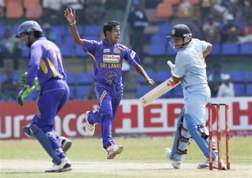 Nuwan Kulasekera and wicket-keeper Kumar Sangakkara celebrate the dismissal of Suresh Raina during the final ODI match between India and Sri Lanka in Colombo on Sunday. (AP Photo) 5th ODI: India vs Sri Lanka