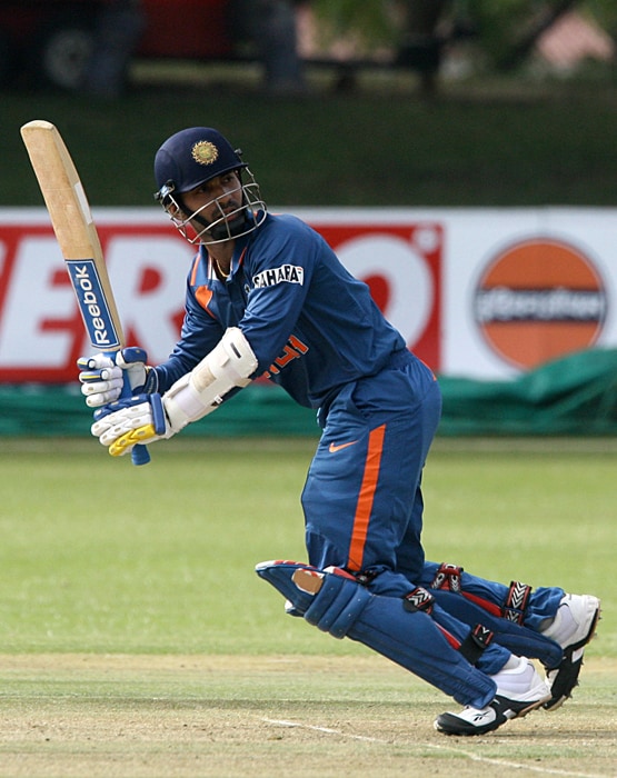 Batsman Dinesh Karthik flicks the ball for a run. (AFP Photo) 1st ODI: Ind vs Zim
